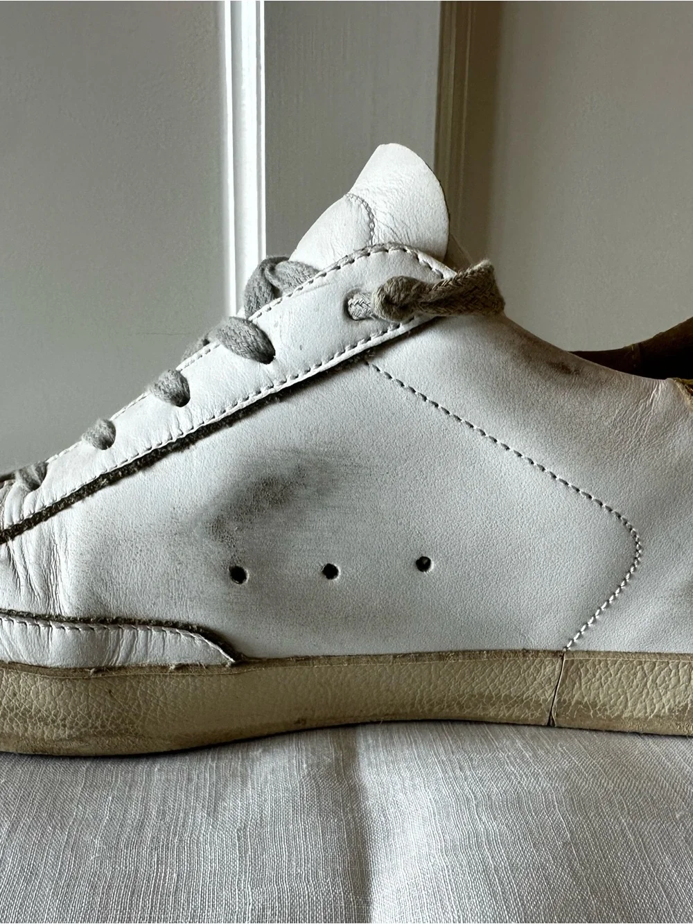 Golden Goose beige logo